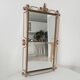 Vintage Hollywood Regency mirror from the 1950s.
