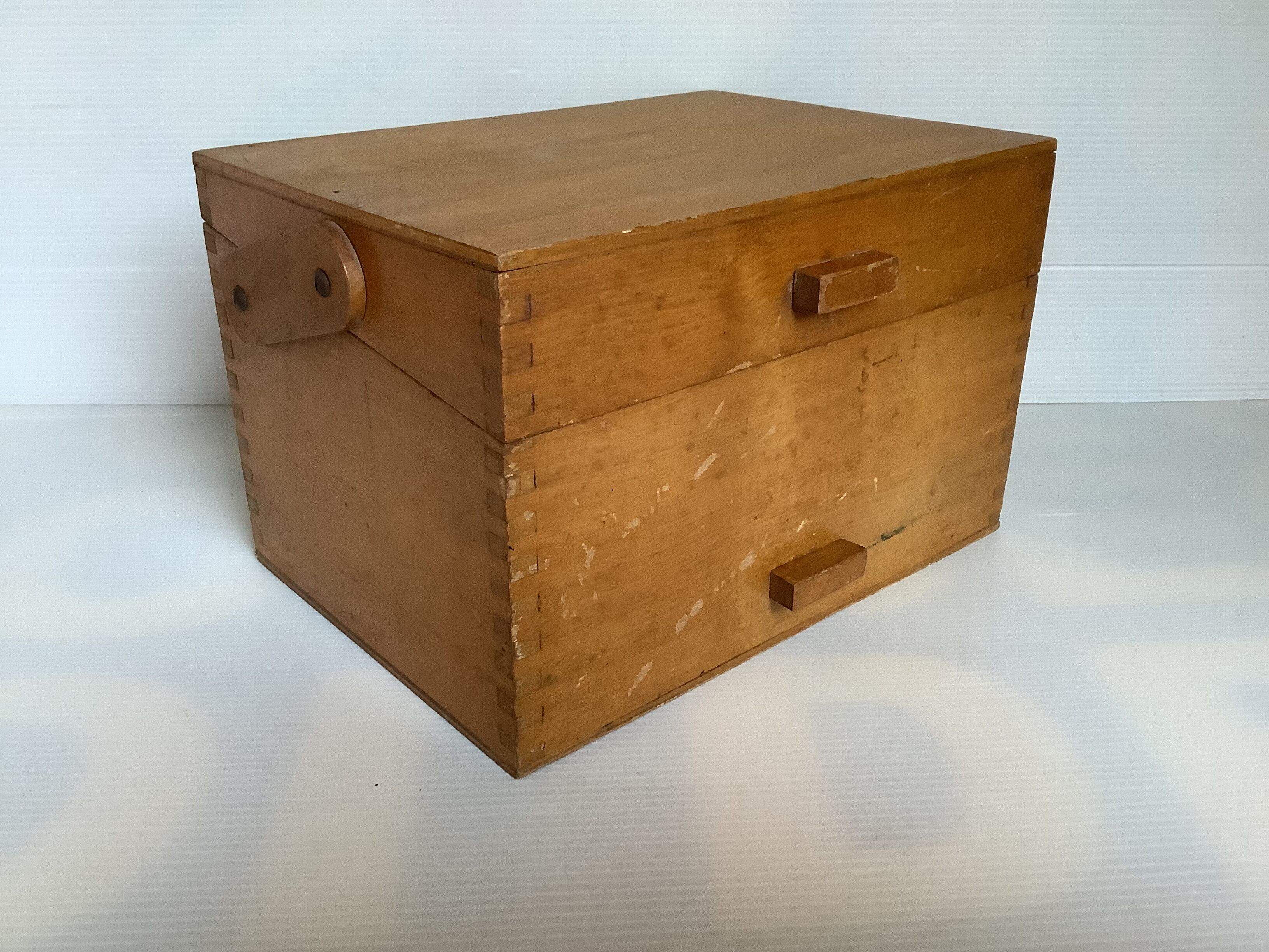Wooden storage box dovetail mounting