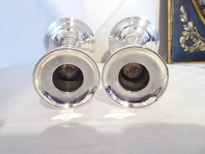 Pair of silver metal candle holders