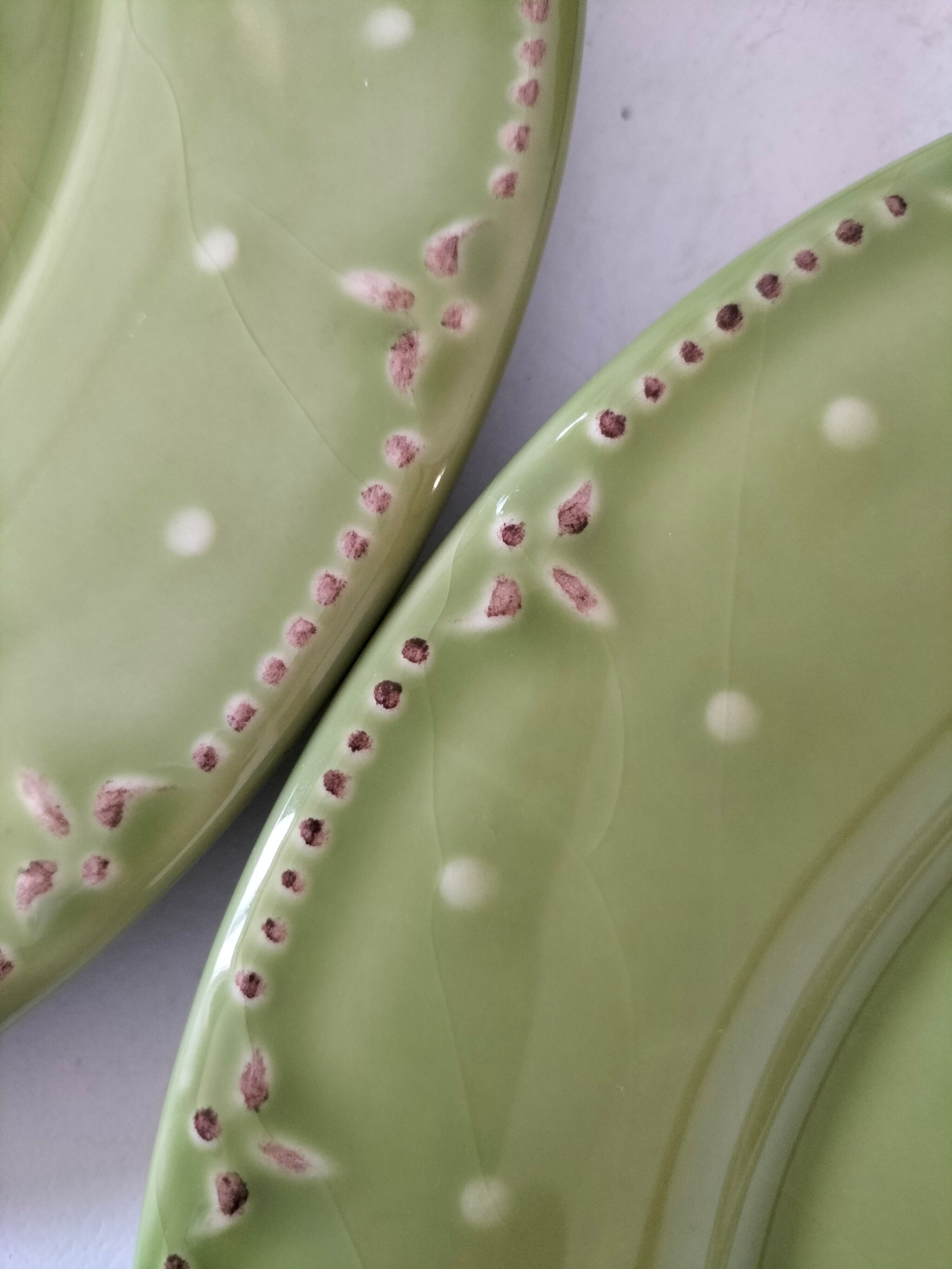 6 olive green plates with dotted relief, workshop ceramic style
