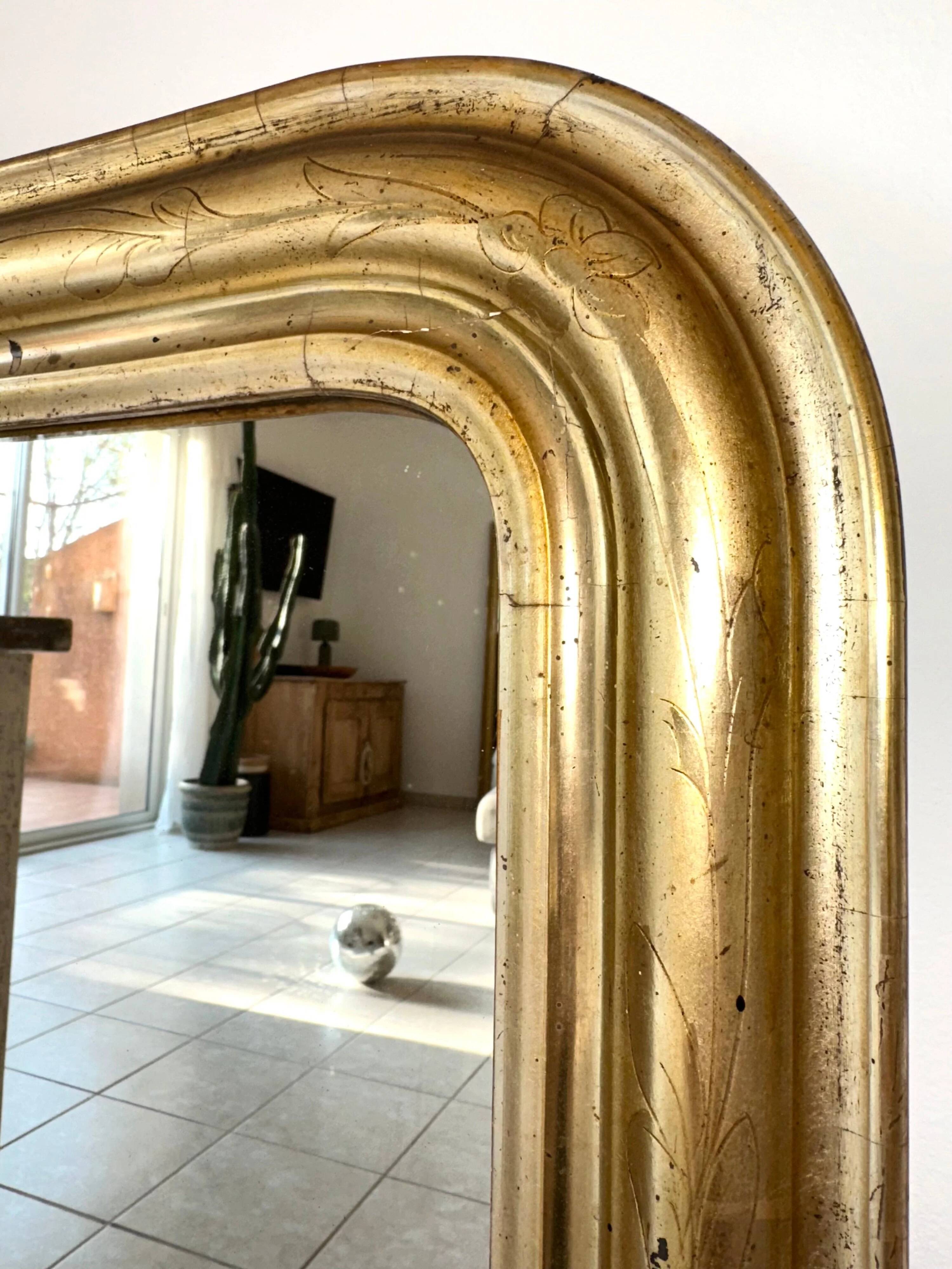 Miroir Louis-Philippe doré à la feuille d’argent, XIXème s.
