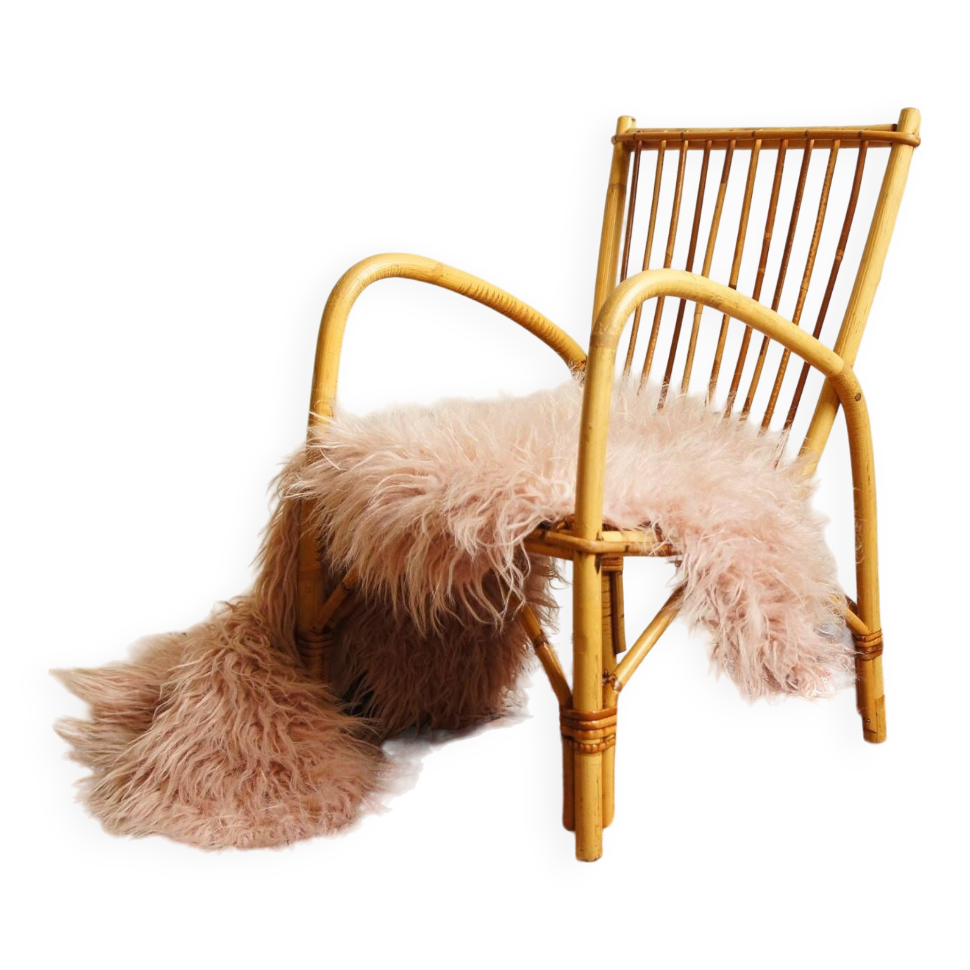 Children's rattan armchair & its old pink skin