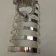 6 glass coasters and silver metal holder