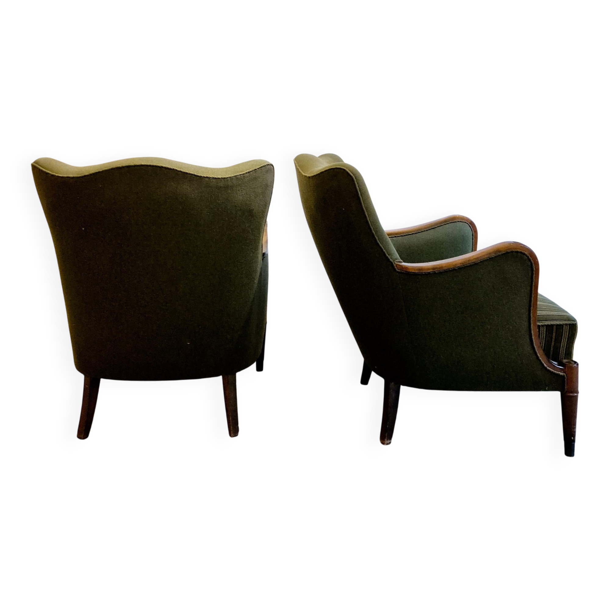 Modern Danish armchairs by Alfred Christensen. Beautiful shape, brass legs.