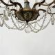 Louis XVI style chandelier with a pearl garland and painted tin, 20th century.