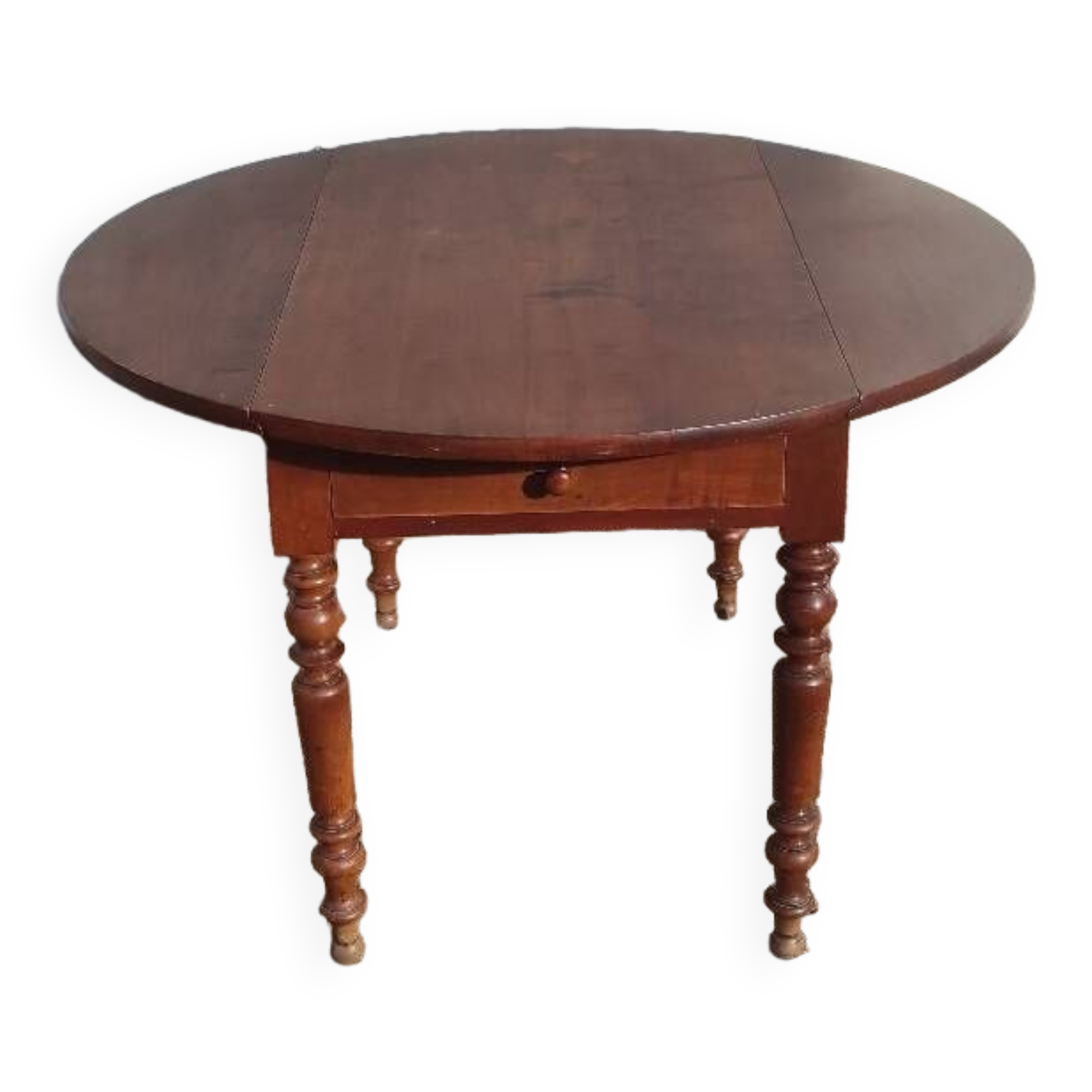 Old extendable round table in fruit wood with folding sides