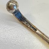 silver metal sugar bowl with gold patina