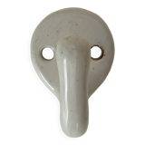 Antique enamelled cast iron wall hook from the 30s/40s