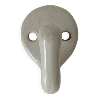 Antique enamelled cast iron wall hook from the 30s/40s