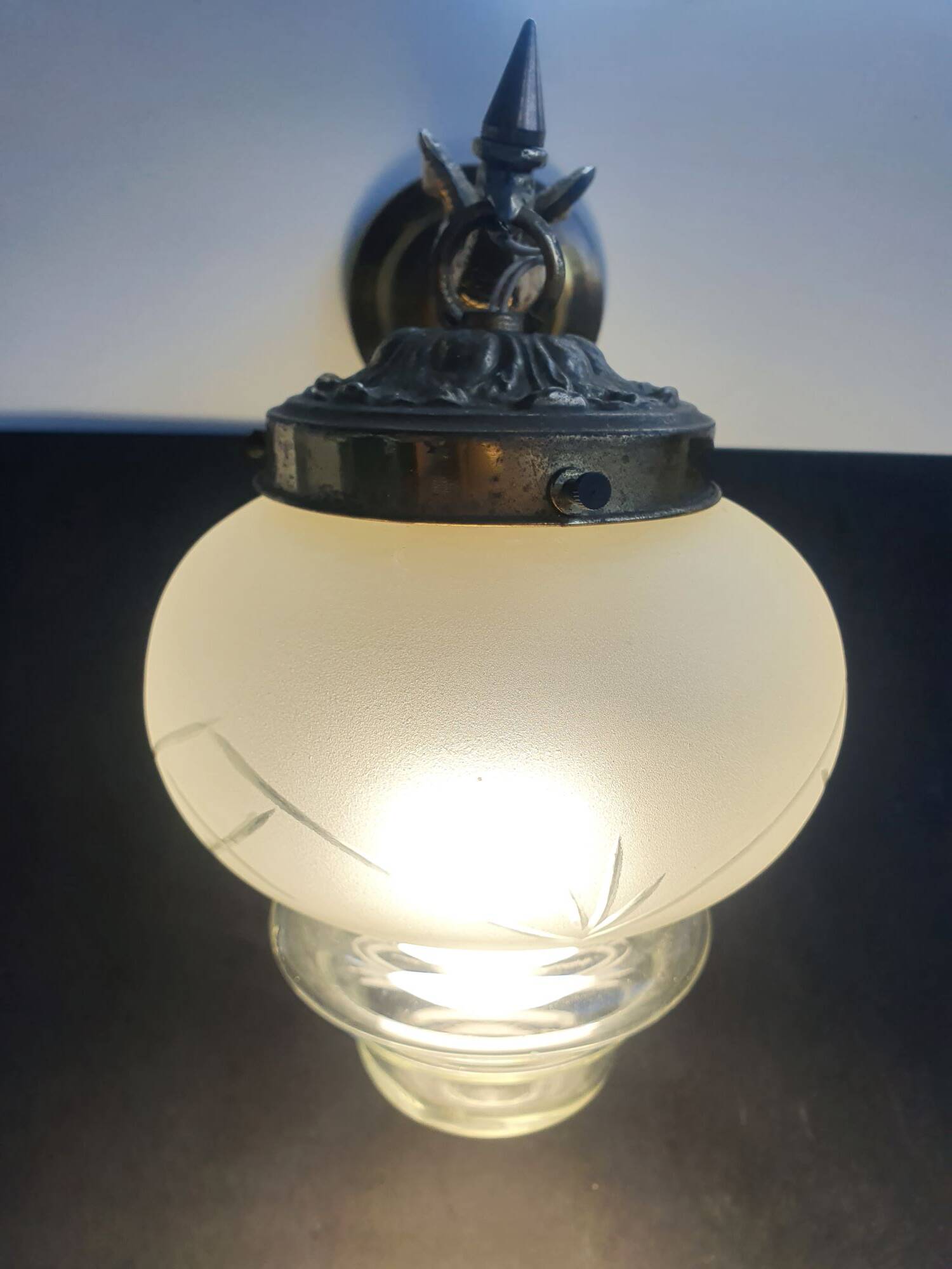 Pair of antique bronze wall sconces