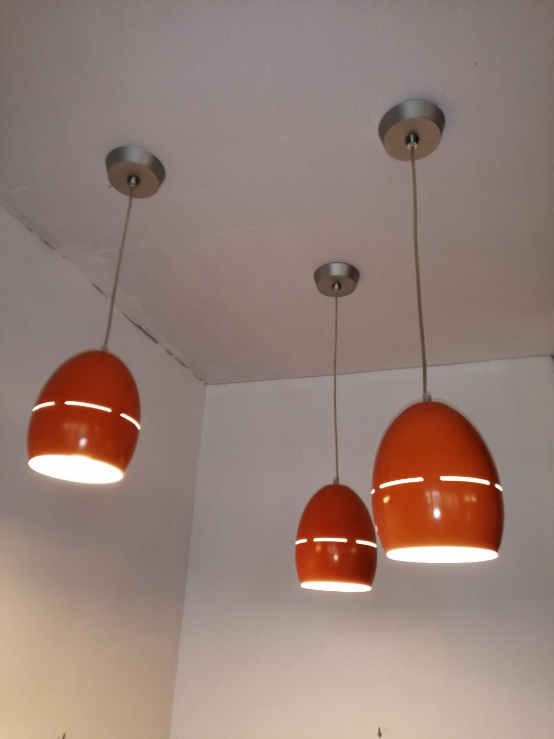 Suite of 3 vintage orange pendant lamps 70s