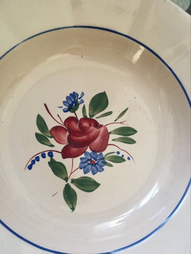 Matching old hollow plates in pink and green.