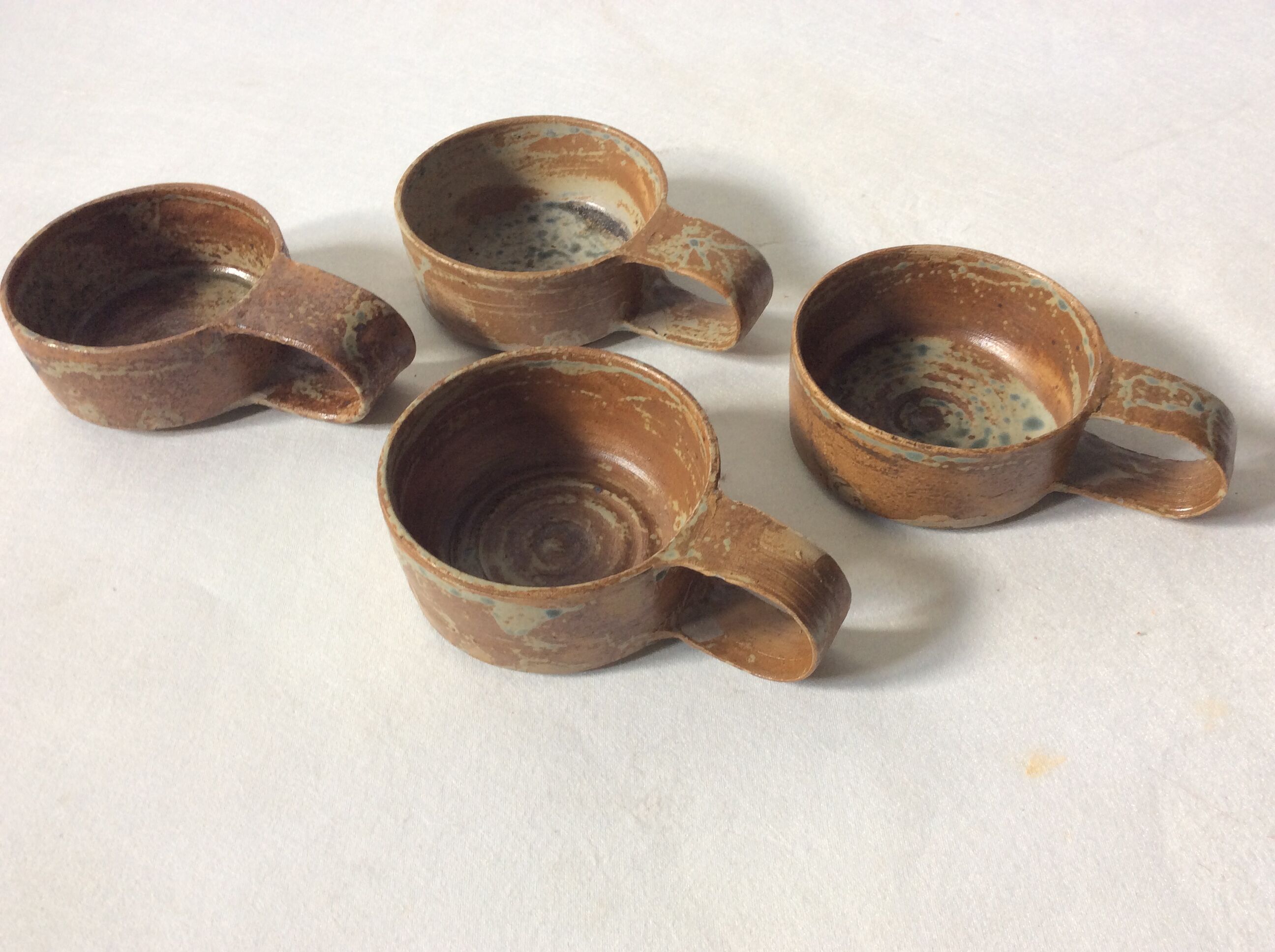 Raw sandstone cups