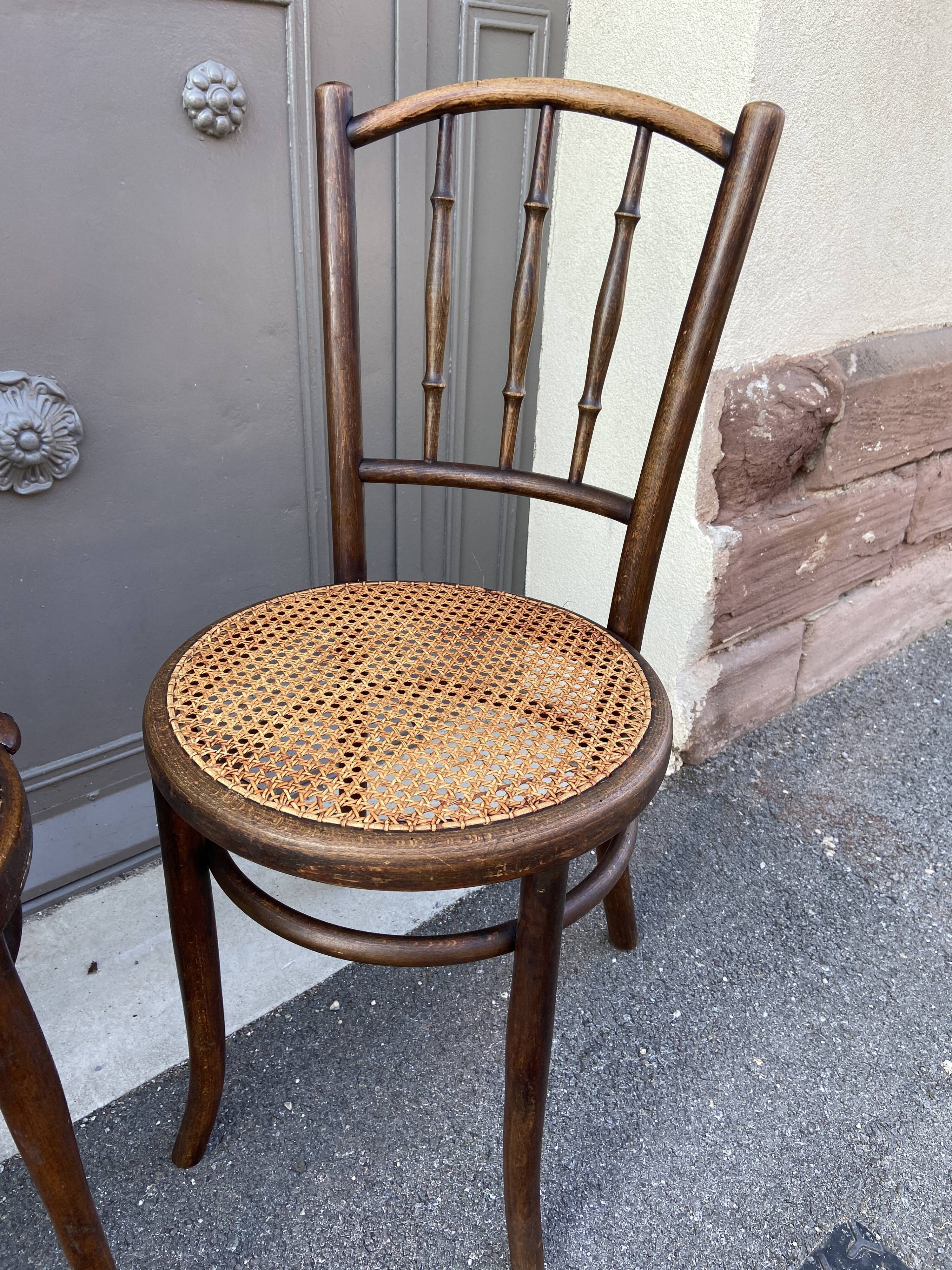 Set of 4 Mismatched pramed wood coffee bistro chairs