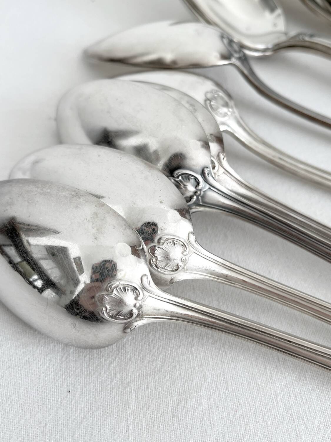 12 antique silver plated shell soup spoons