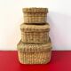 Vintage trio of small rattan nesting baskets