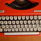 Portable typewriter " Olympia traveller de luxe " , red , in working order