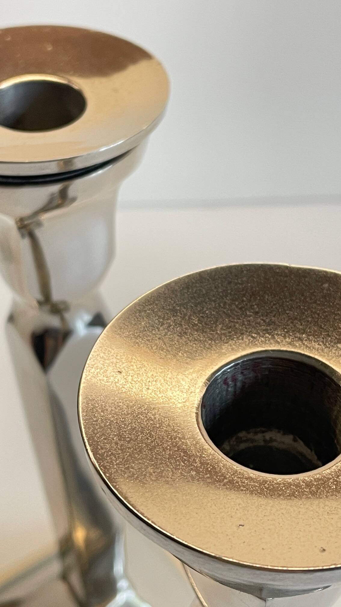 Pair of vintage cast aluminum candlesticks