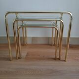 Glass and gold nesting table from the 70s