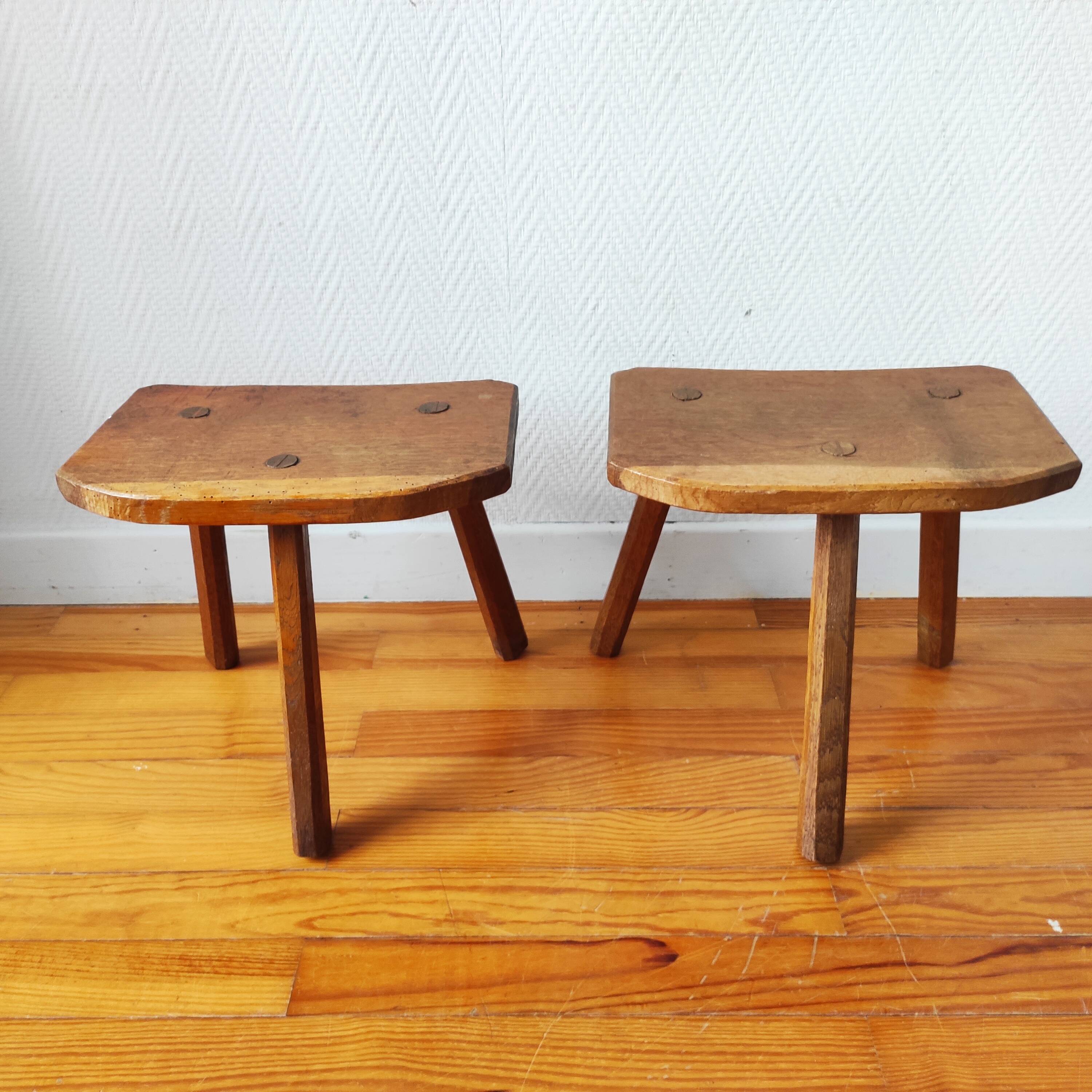 Pair of brutalist tripod stools in solid wood.
