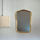 Vintage wall mirror with gold rim