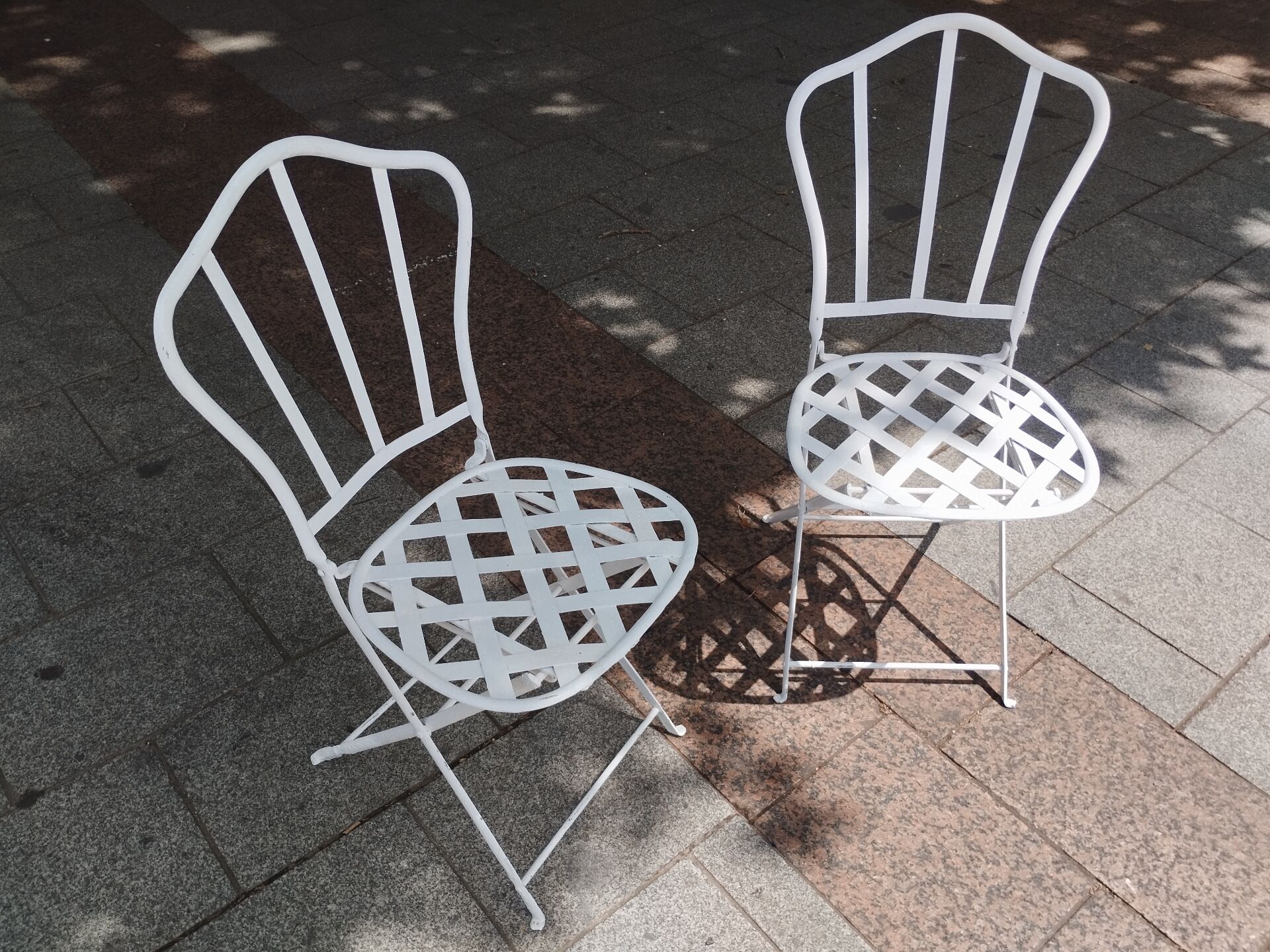 Antique garden furniture in solid wrought iron.