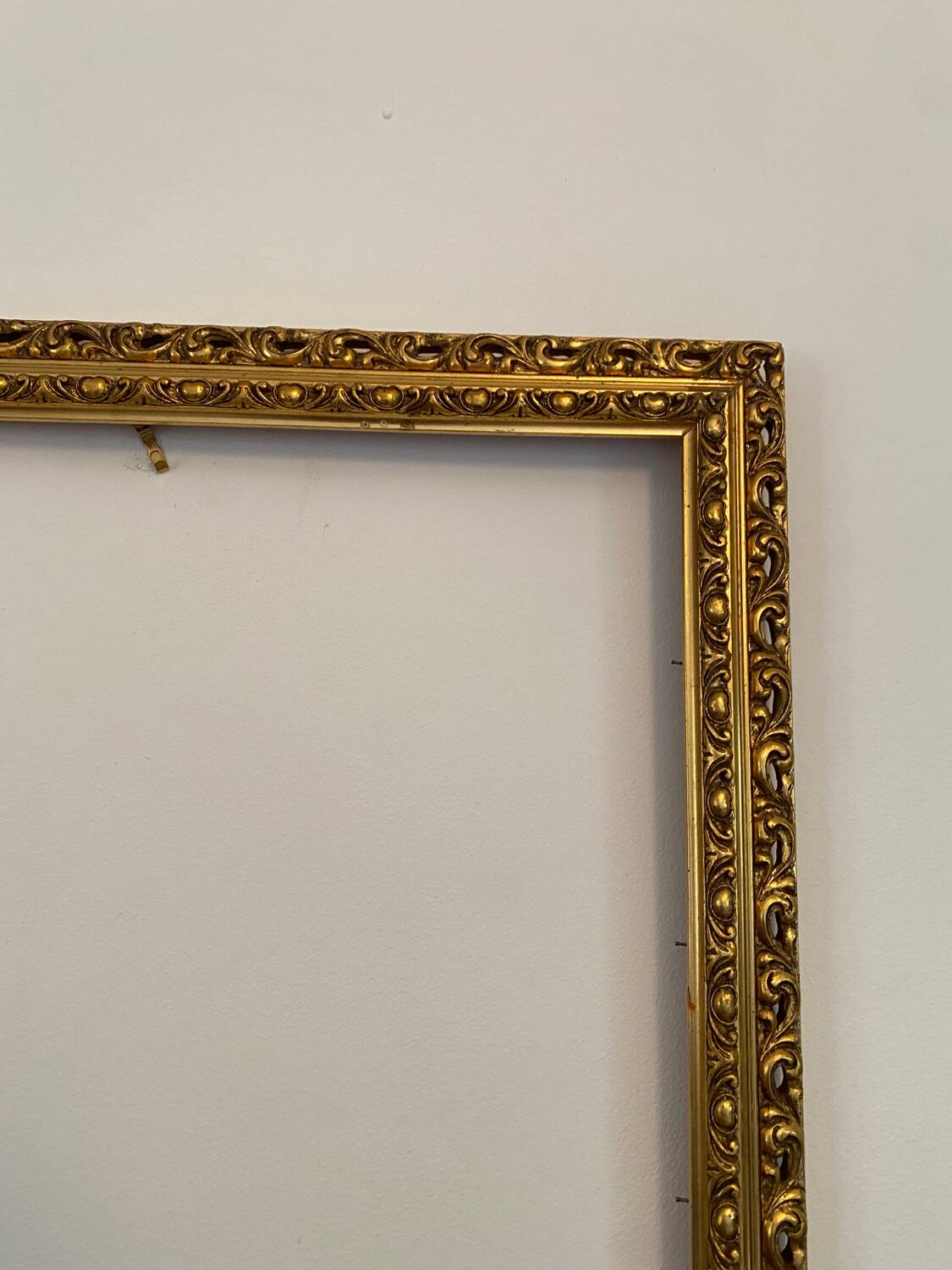 Old gilded carved wooden frame
