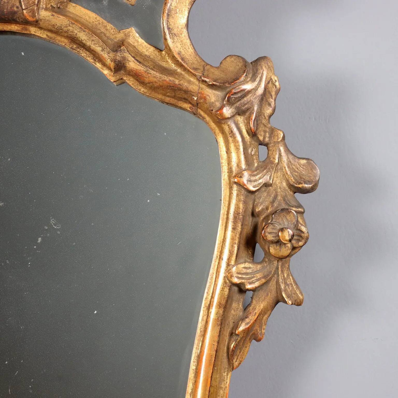 Antique baroque mirror in carved and gilded wood, Italy, 18th century