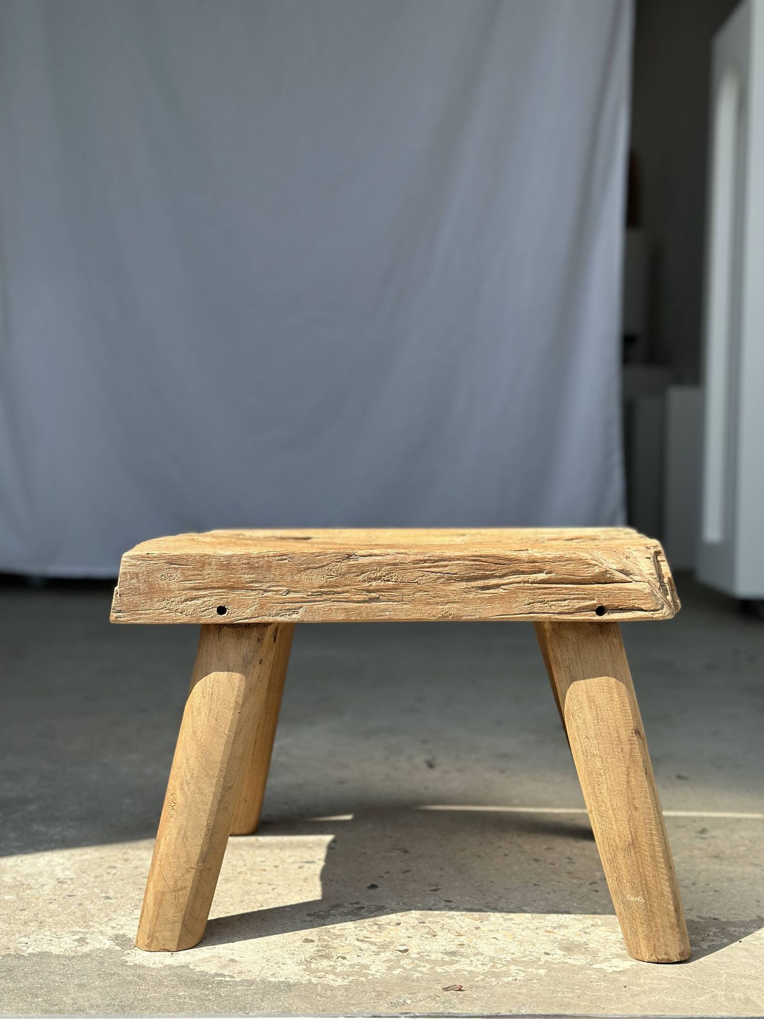 Small side table or stool in four-legged blond teak H:30 L43 l30