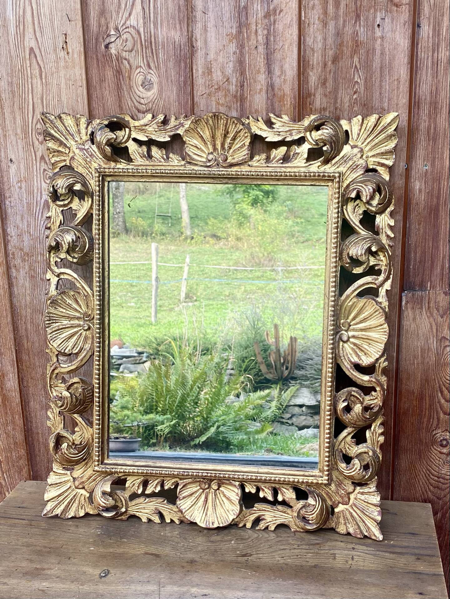 Antique mirror in carved wood