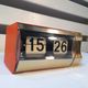 Vintage Jaz flip flap alarm clock model Vibric - 1974 - Orange and Gold