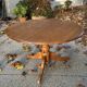 Round pine table with a diameter of 120 cm.