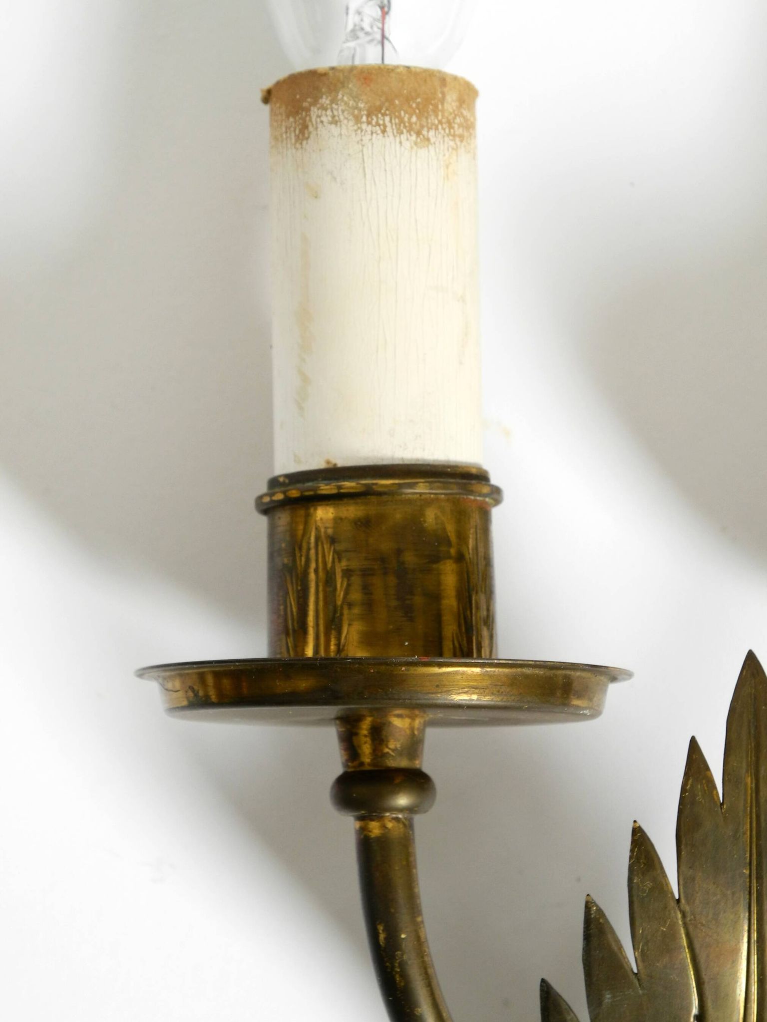 A pair of mid-century modern brass wall lamps by Vereinigte Werkstätten