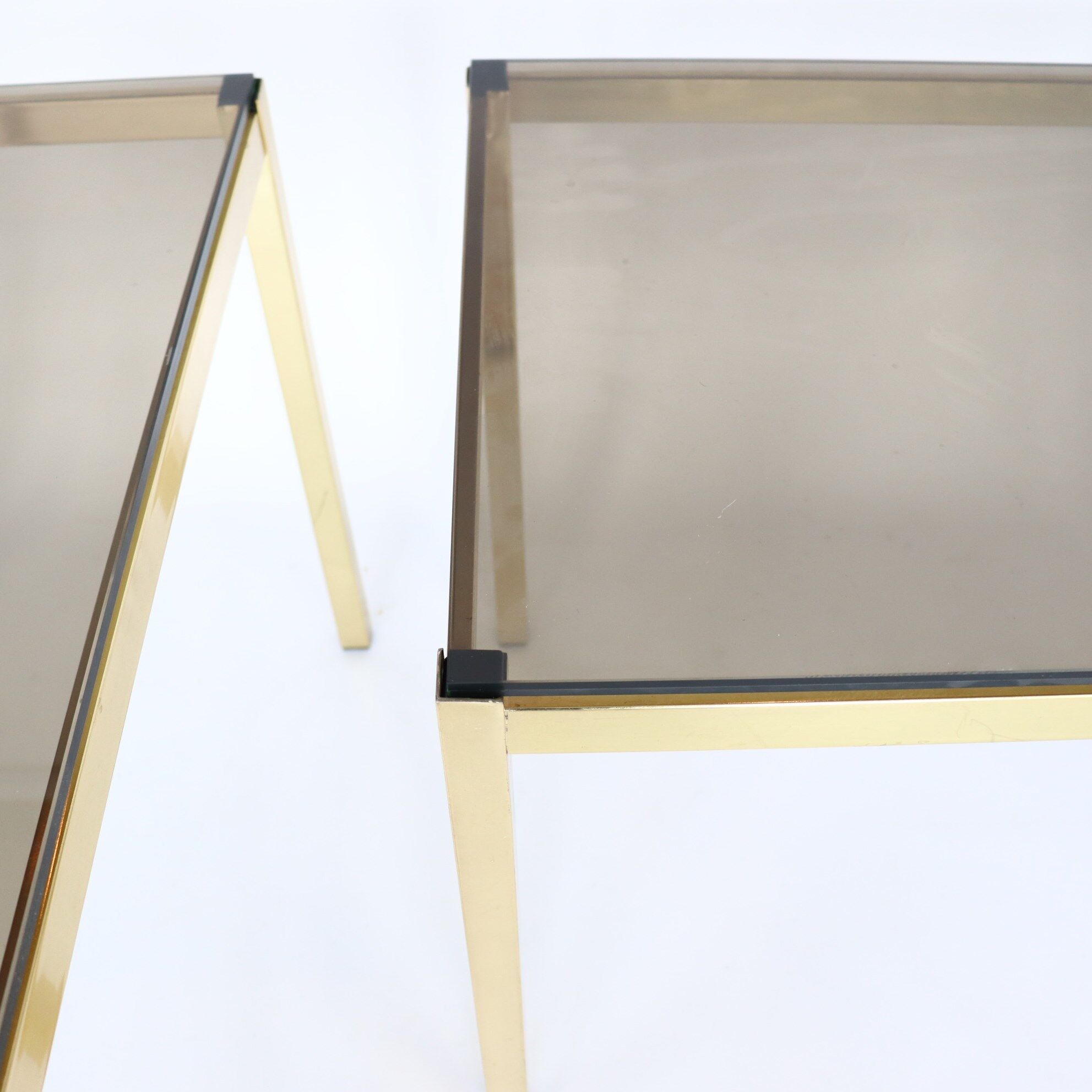 Pair of gilded metal side tables