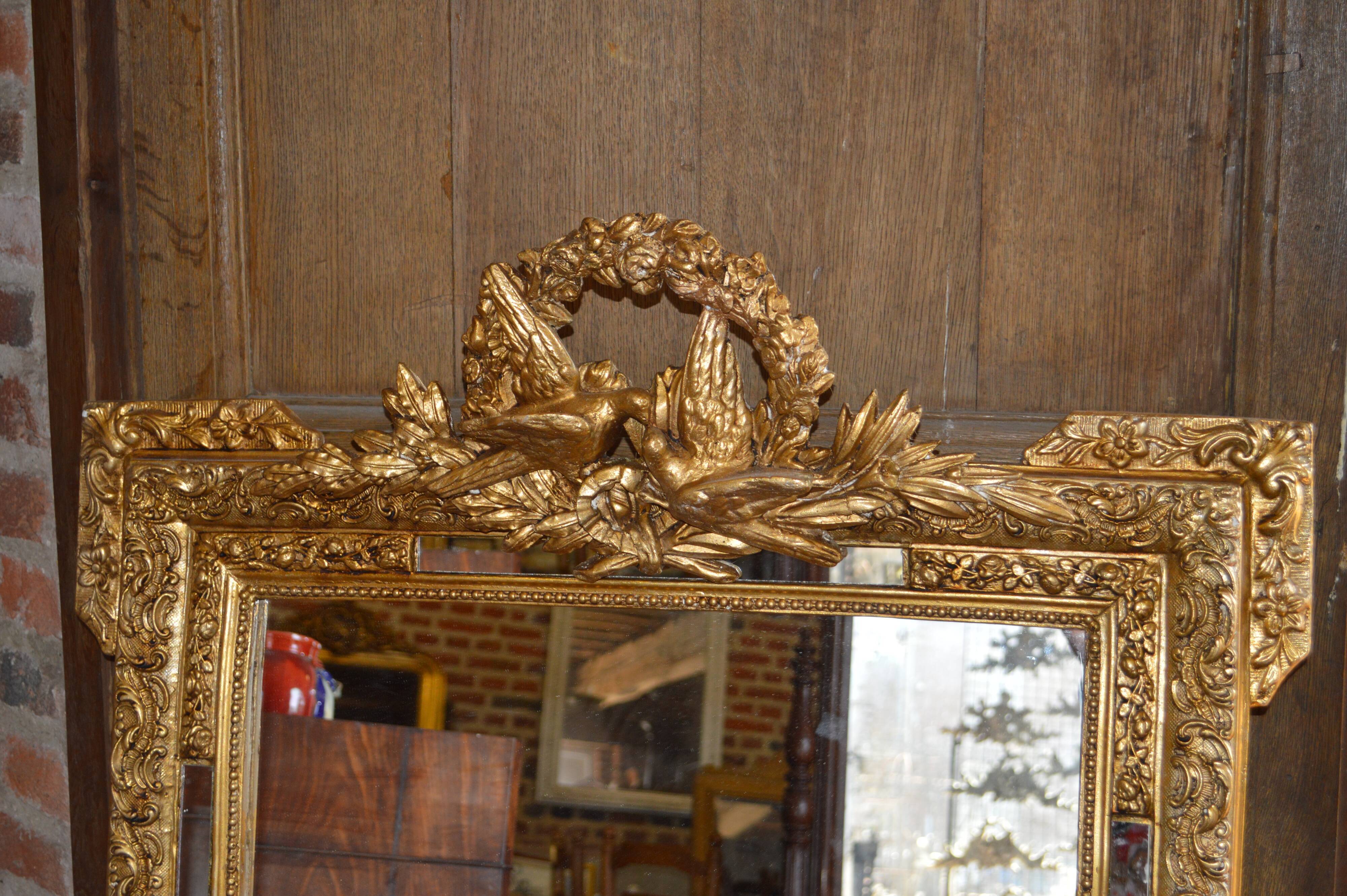 Golden mirror with doves  122x82cm