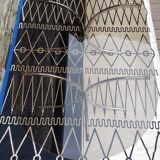 Oval table in smoked glass and metal foot