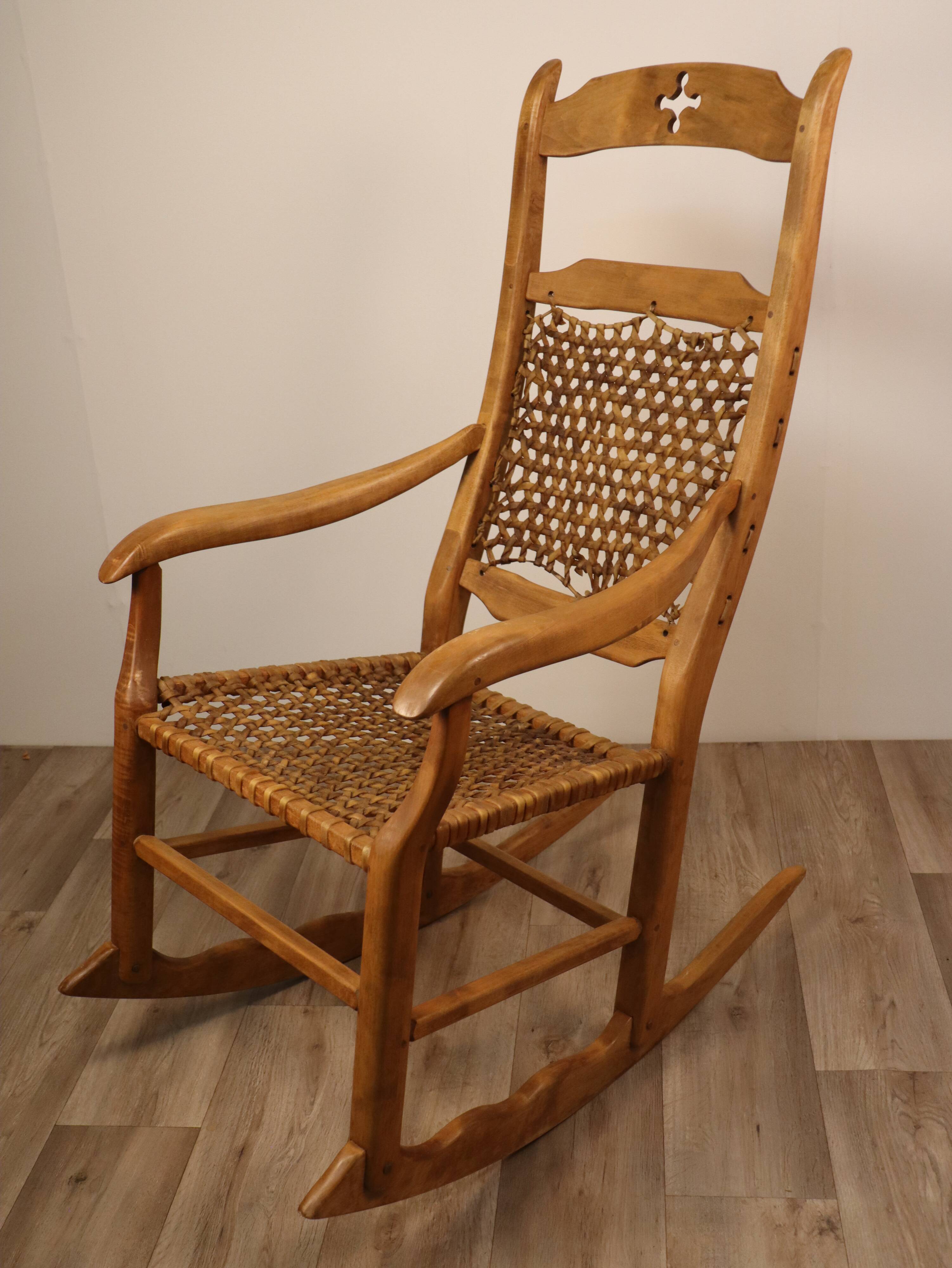 Vintage rocking chair in solid wood 1950