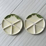2 ceramic plates depicting a lemon