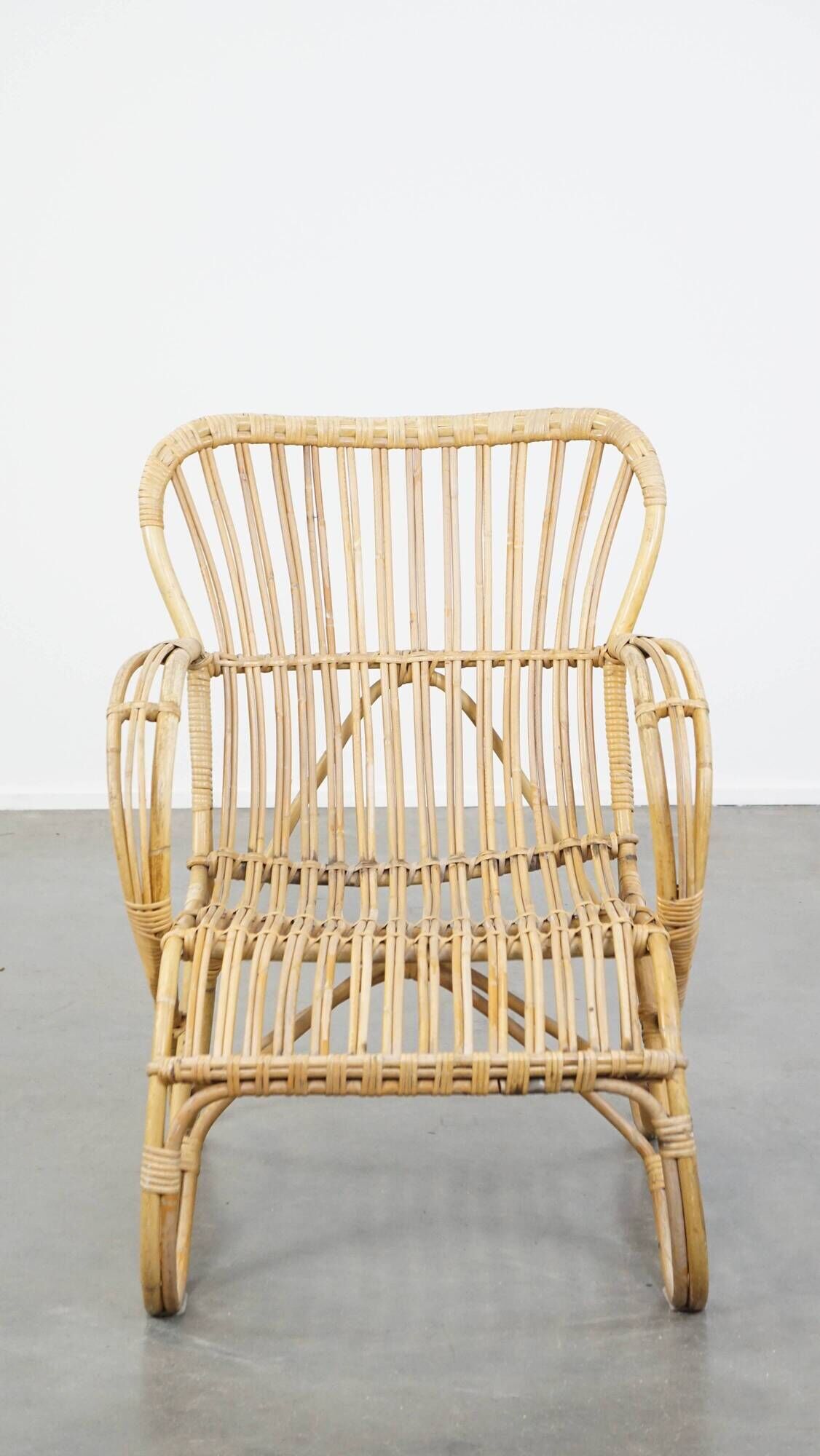Vintage 1950s Dutch design rattan armchair with organic shapes