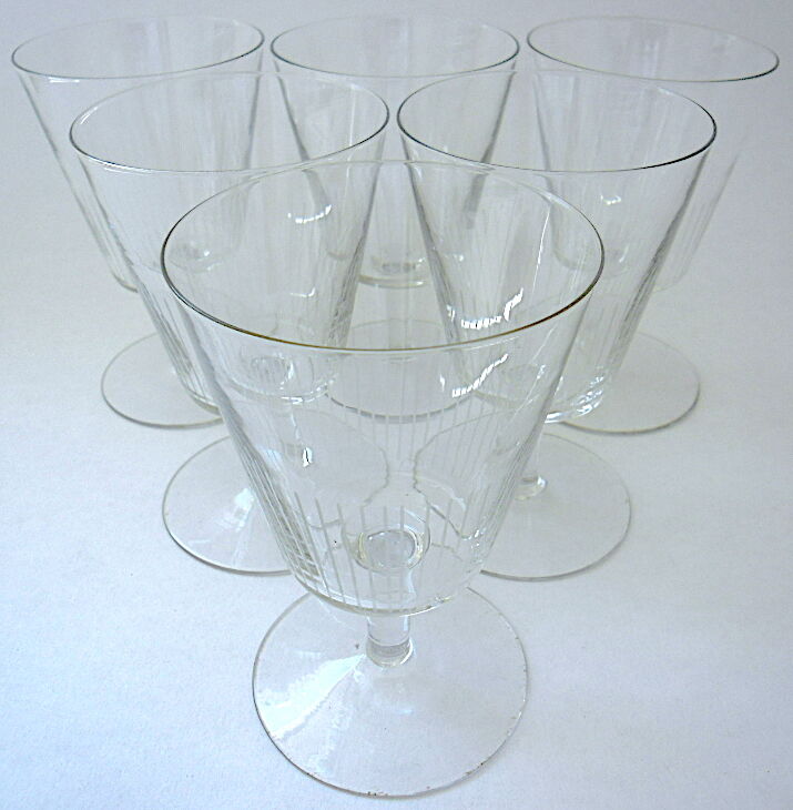 Suite of six art-deco glasses with red wine in modernist shape in cut crystal