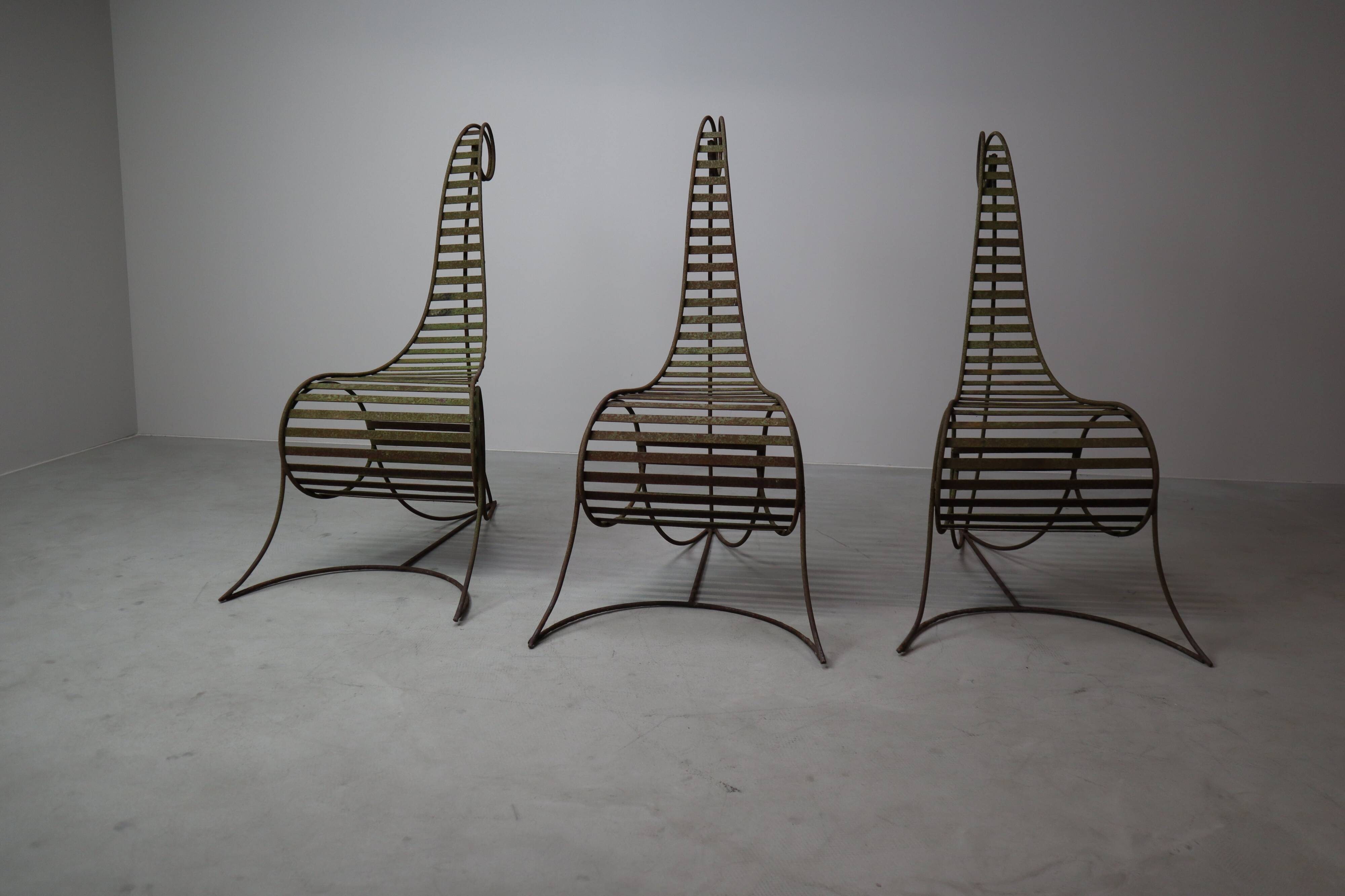 Set of three sculptural iron chairs