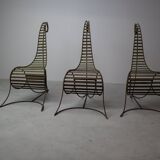 Set of three sculptural iron chairs