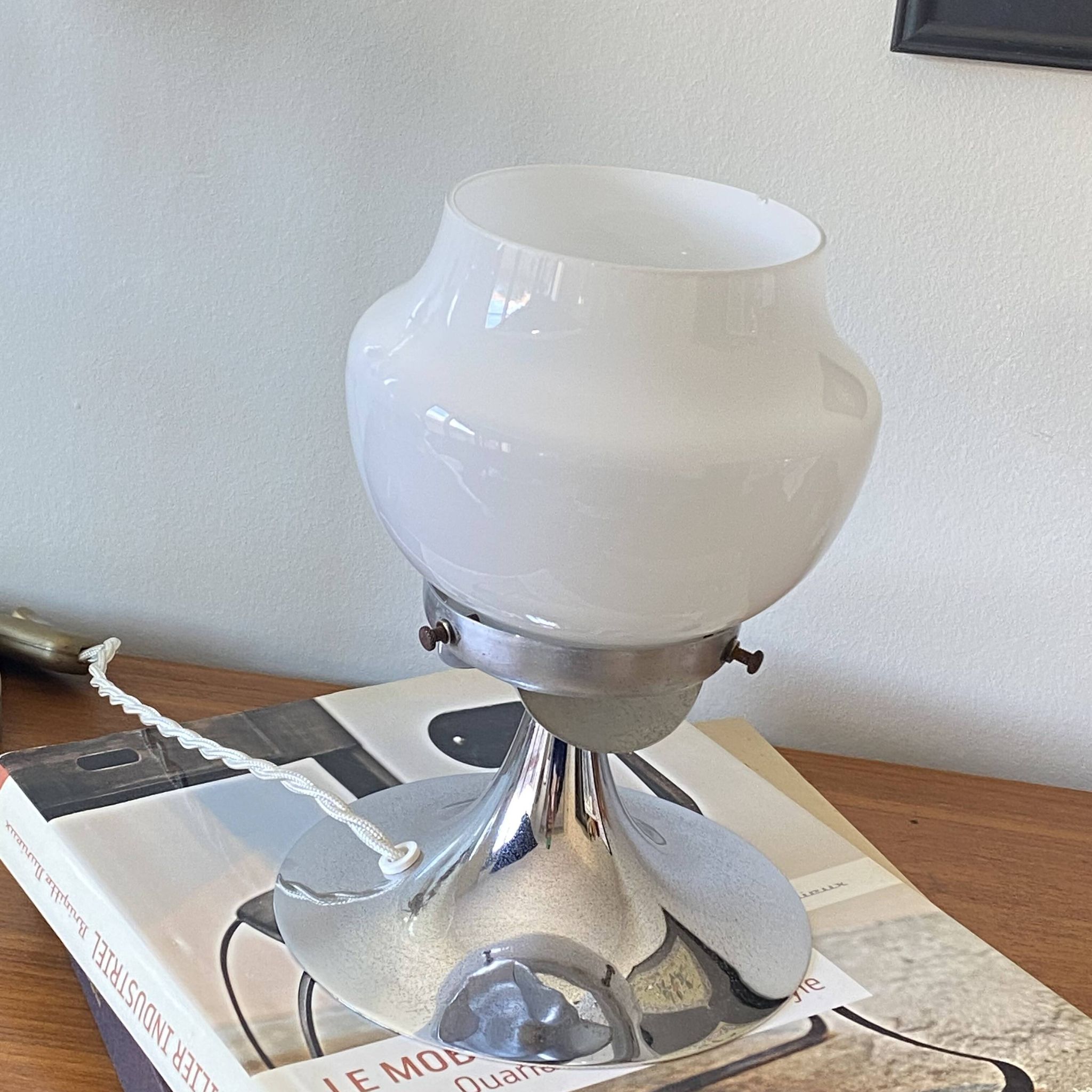 Vintage globe lamp in white opaline glass and chrome metal.