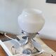 Vintage globe lamp in white opaline glass and chrome metal.