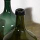 Antique green demijohns (circa 1920). Set of 3 pieces