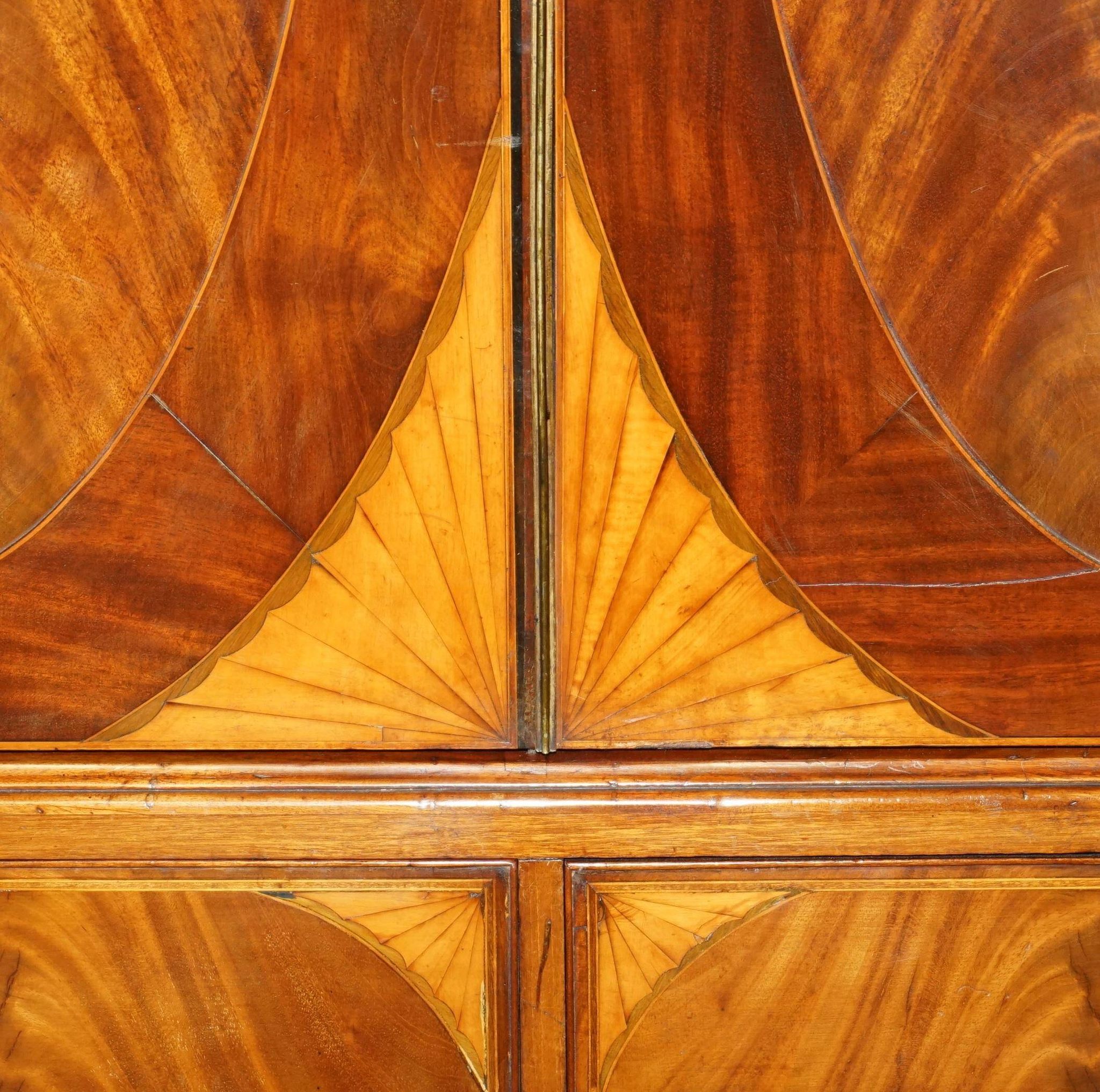 George III Sheraton linen cupboard in walnut, circa 1760.