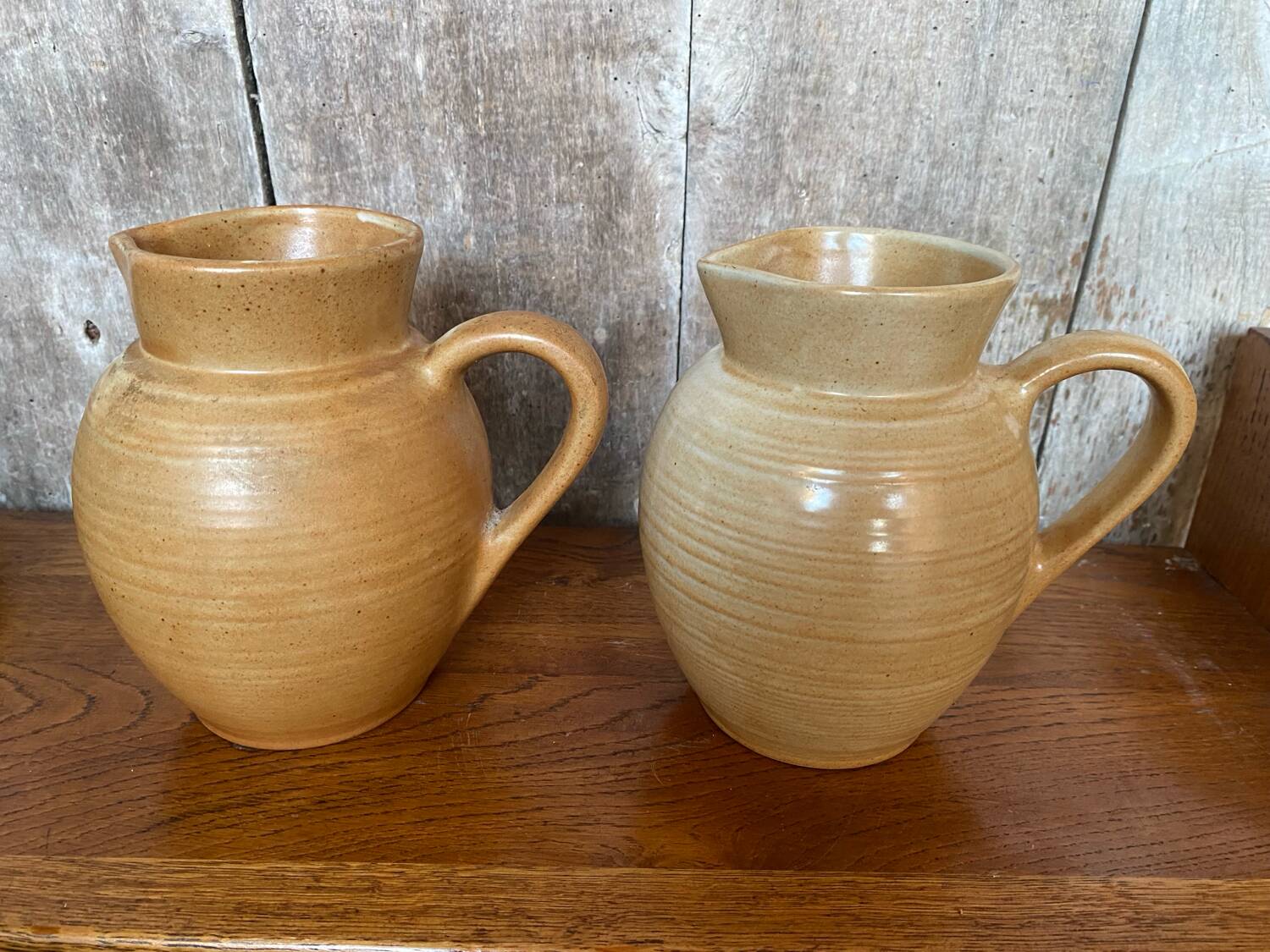 Pair antique cnp village beige & cream stoneware pitchers vintage