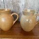 Pair antique cnp village beige & cream stoneware pitchers vintage