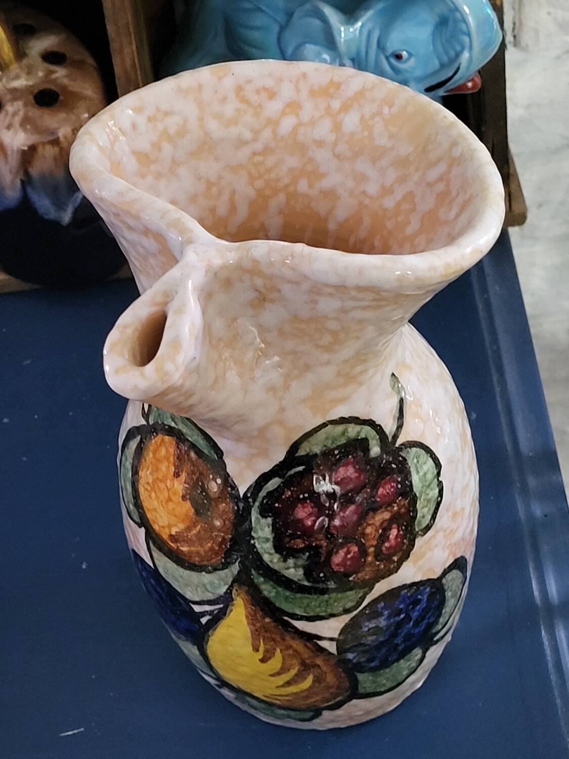 Pitcher decorated with fruit