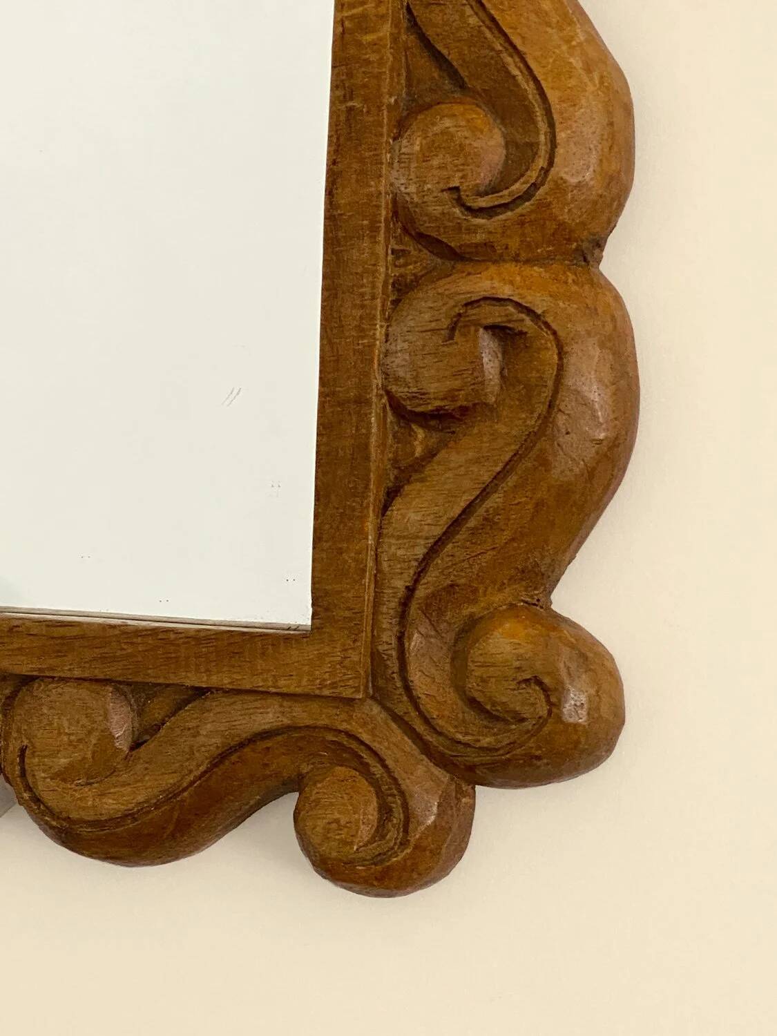 Carved wooden mirror